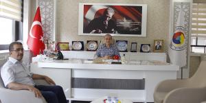 İlahiyat Fakültesi Dekanı Özdemir Başkan Kırlangıç'ı Ziyaret Etti